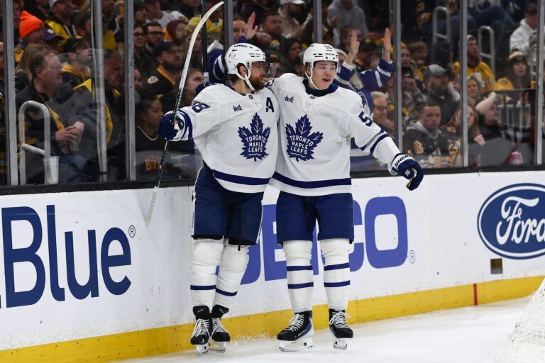 Toronto Maple Leafs right wing William Nylander (88) celebrates his goal with right wing Easton Cowan (53) during the third period against the Boston Bruins at TD Garden.