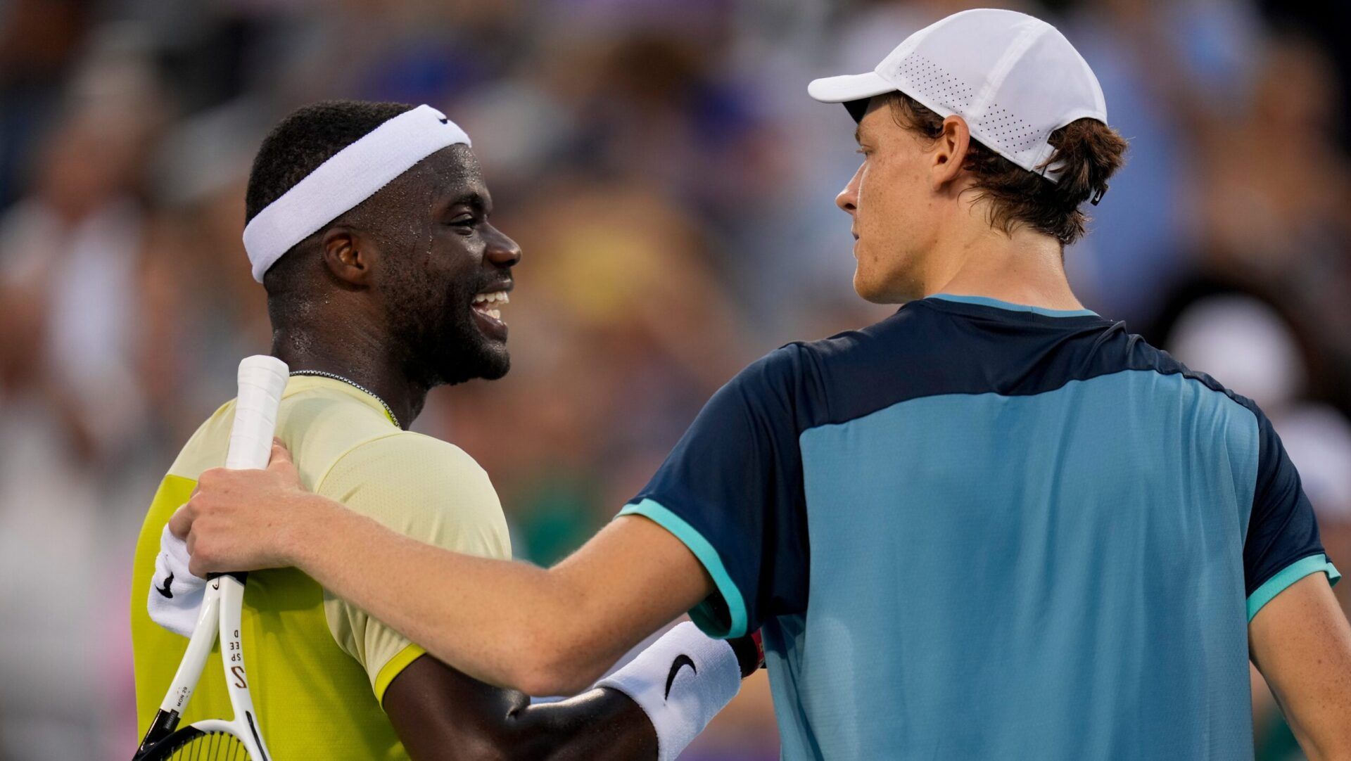 Frances Tiafoe (left) and Jannik Sinner shake hands after the second set of the men’s championship match of the Cincinnati Open at the Lindner Family Tennis Center in Mason, Ohio, on Monday, Aug. 19, 2024. Jannik Sinner defeated Frances Tiafoe, 7-6, 6-2, in the championship match.