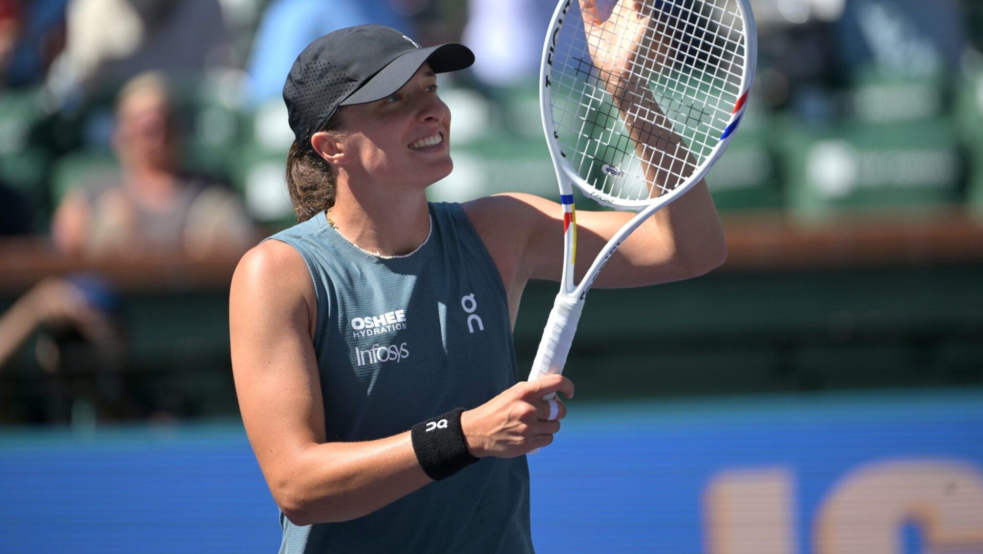 Iga Swiatek (POL) reacts after defeating Karolina Muchova (CZE) during the fourth round in the BNP Paribas Open at the Indian Wells Tennis Garden.