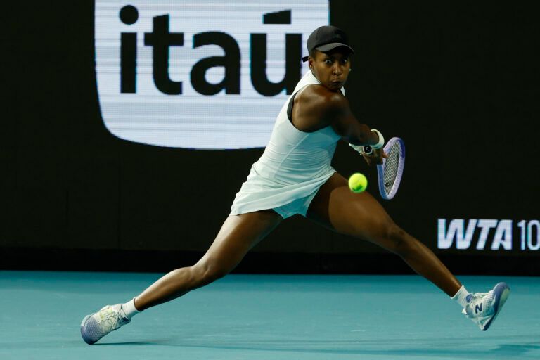Coco Gauff (USA) reaches for a backhand against Belinda Bencic (SUI) (not pictured) on day eight of the 2026 Miami Open at Hard Rock Stadium.