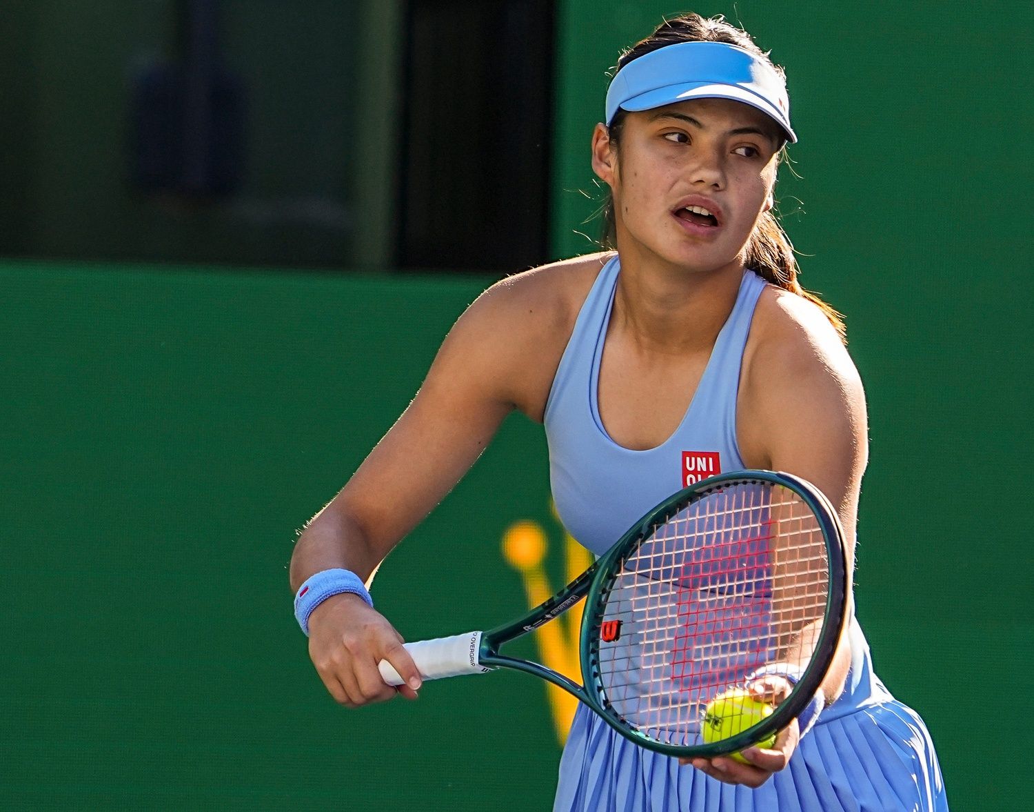 Emma Raducanu gets set to serve to Amanda Anisimova during their third-round match at the BNP Paribas Open in Indian Wells, Calif., Sunday, March 8, 2026.