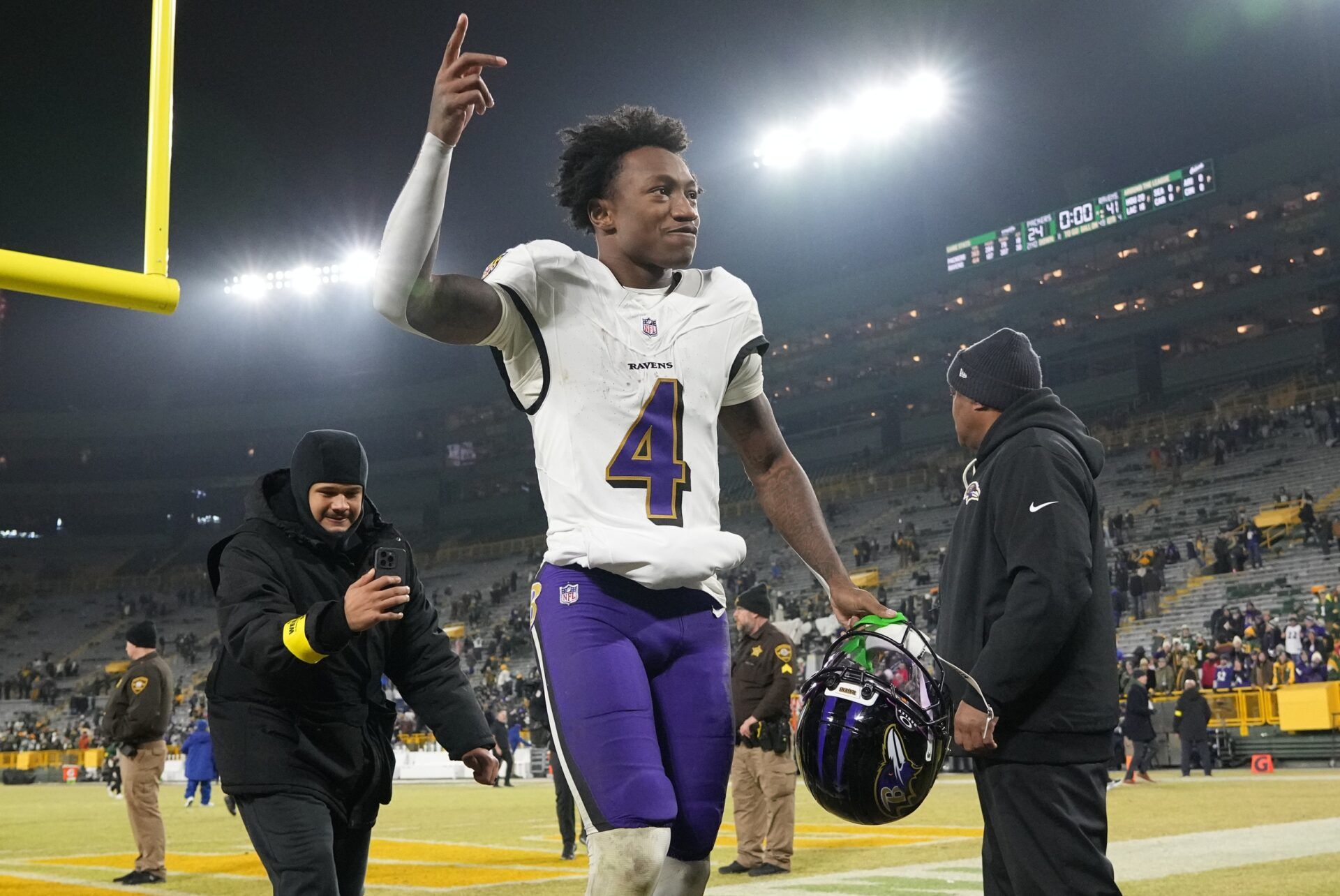 Baltimore Ravens wide receiver Zay Flowers (4) celebrates after the game against the Green Bay Packers at Lambeau Field.