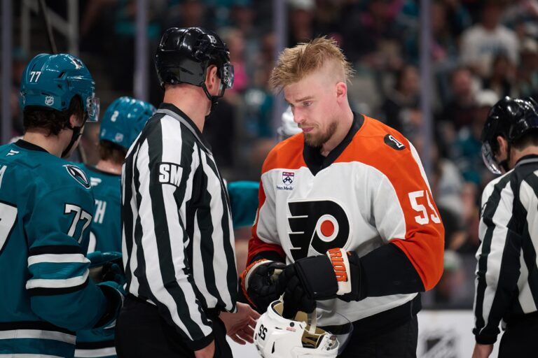 Philadelphia Flyers defenseman Rasmus Ristolainen (55) stands on the ice without his helmet during a stoppage of play against the San Jose Sharks during the third period at SAP Center at San Jose.