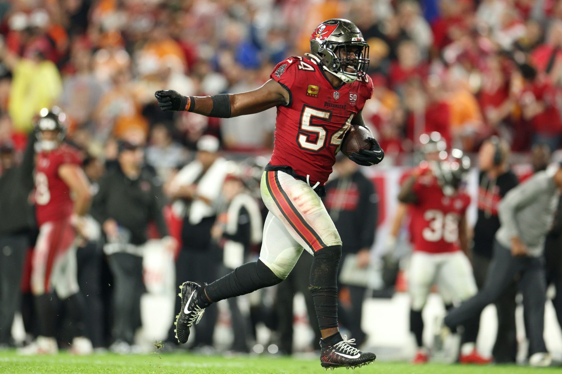Tampa Bay Buccaneers linebacker Lavonte David (54) recovers a fumble by the Carolina Panthers in the second half at Raymond James Stadium.