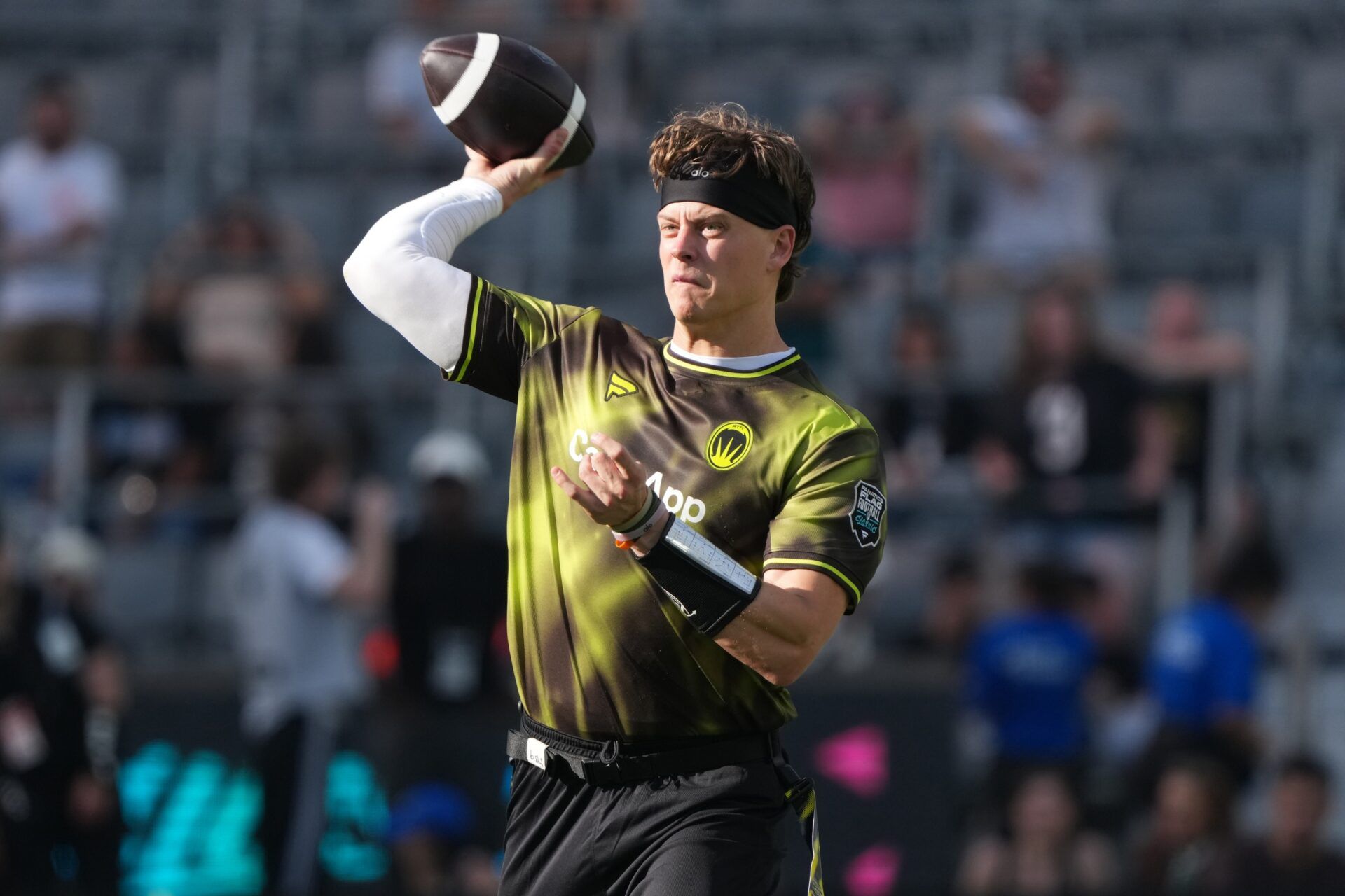 Wildcats FFC quarterback Joe Burrow throws the ball during the Fanatics Flag Football Classic at BMO stadium.