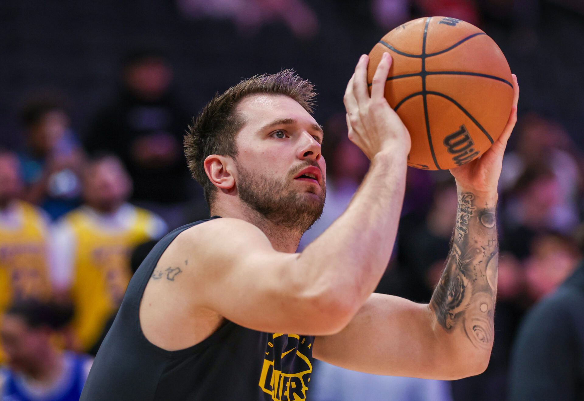 Los Angeles Lakers guard Luka Doncic (77) warms up before playing against the Houston Rockets at Toyota Center.