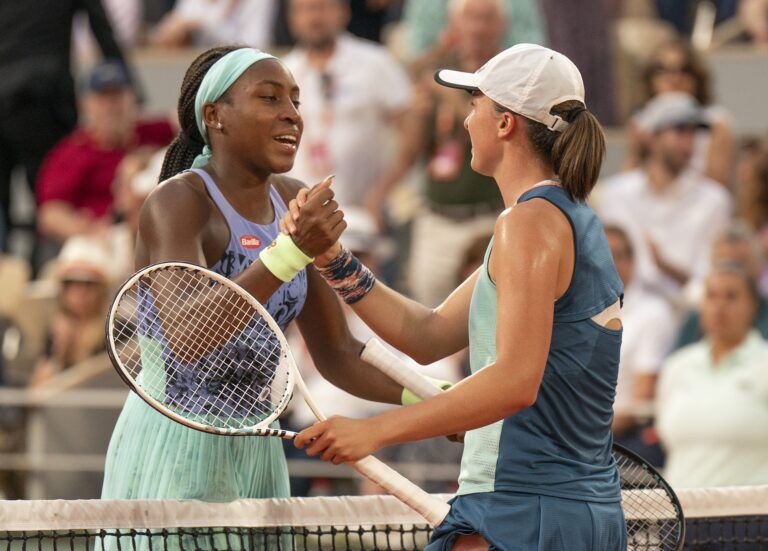 Iga Swiatek (POL) and Coco Gauff (USA) at the net after their women’s final match on day 14 of the French Open at Stade Roland-Garros.