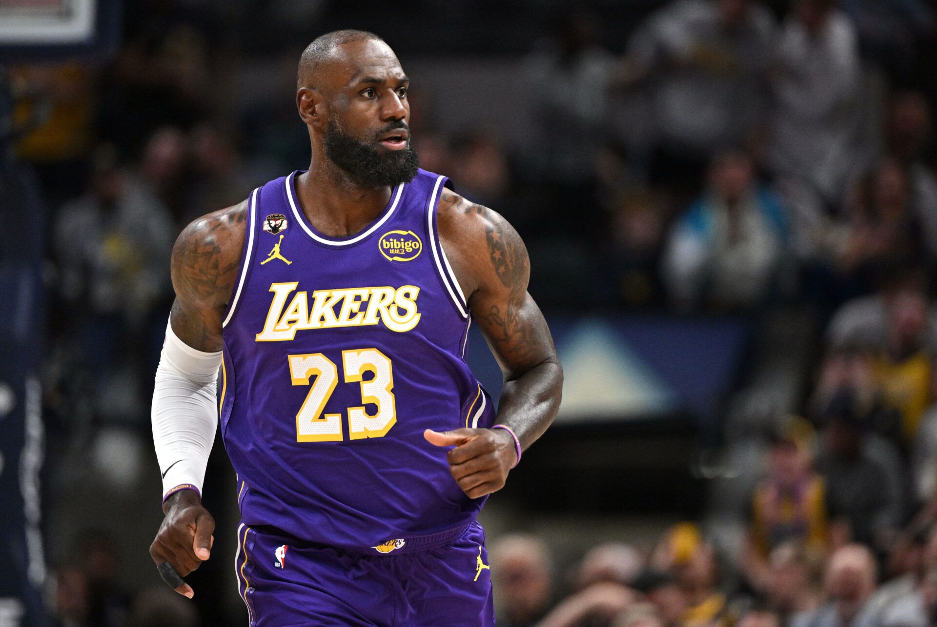 Los Angeles Lakers forward LeBron James (23) runs down court during the first quarter against the Indiana Pacers at Gainbridge Fieldhouse.