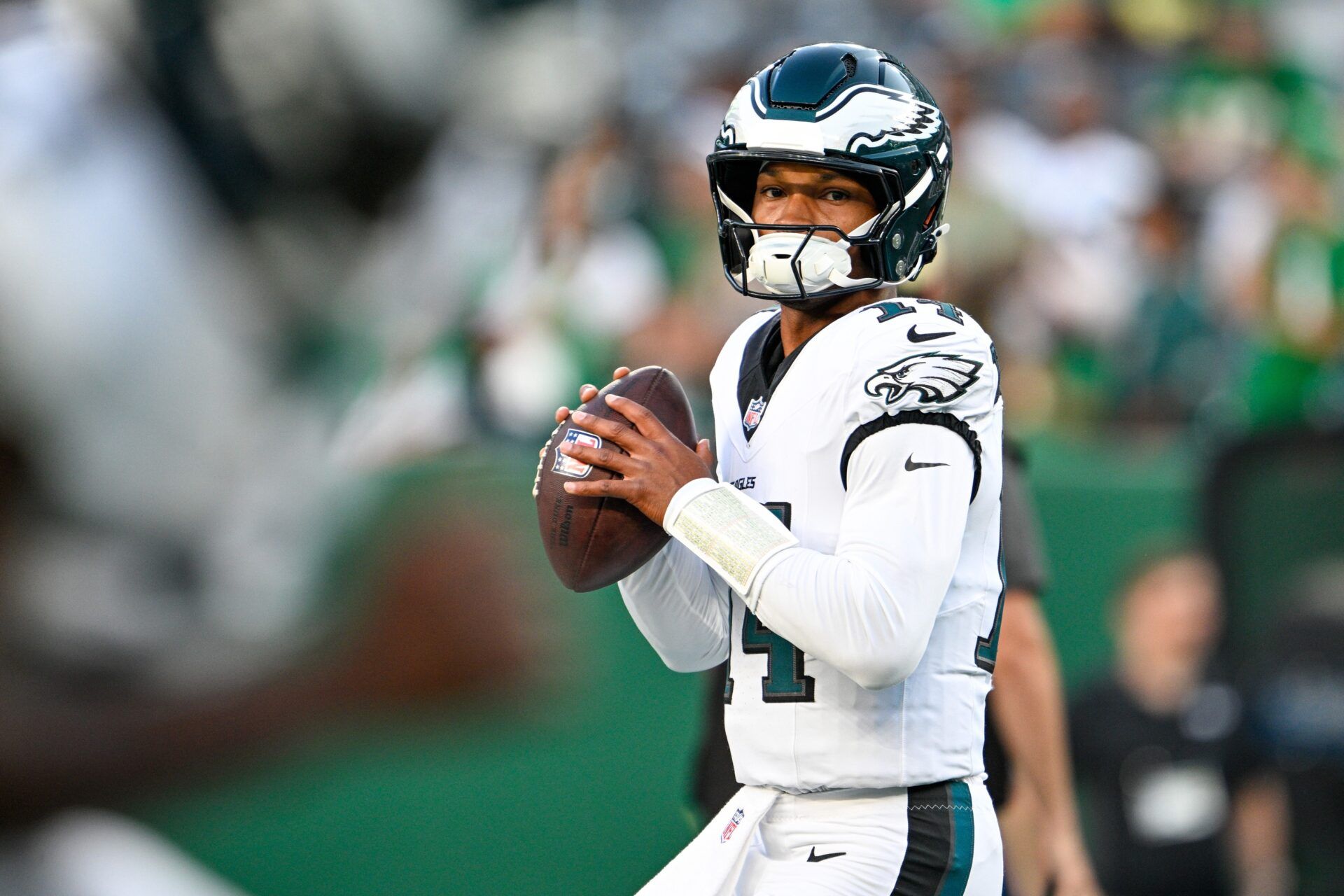 Philadelphia Eagles quarterback Dorian Thompson-Robinson (14) warms up before the game against the New York Jets at MetLife Stadium.
