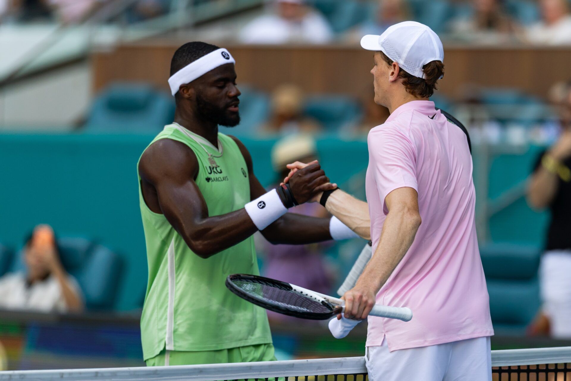 Jannik Sinner of Italy shakes hands with Frances Tiafoe of the United States after a win in the quarter finals of the menÕs singles at the Miami Open at Hard Rock Stadium.