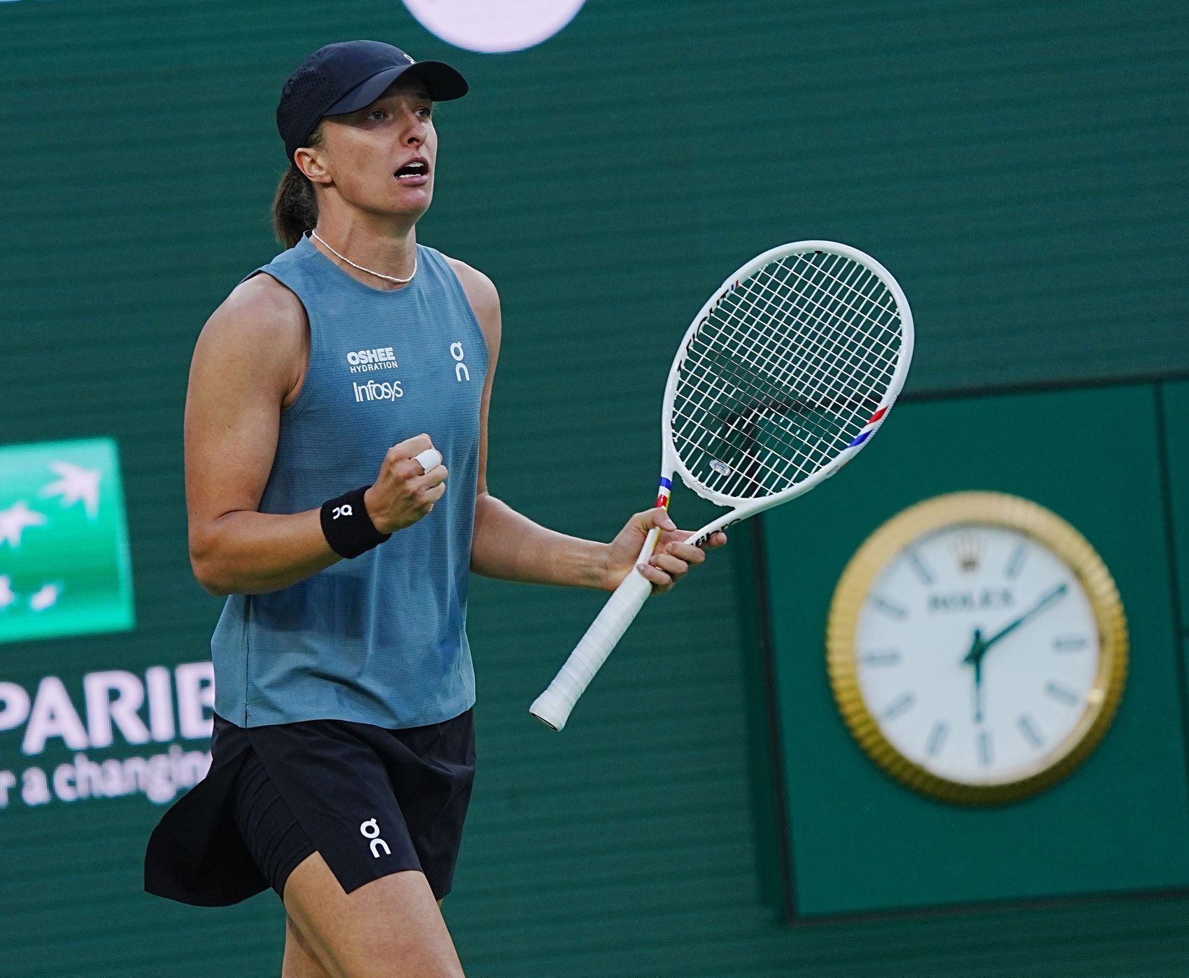 Iga Swiatek celebrates her win over Maria Sakkari in round 3 of the women’s singles at the BNP Paribas Open in Indian Wells, Calif., March 9, 2026.
