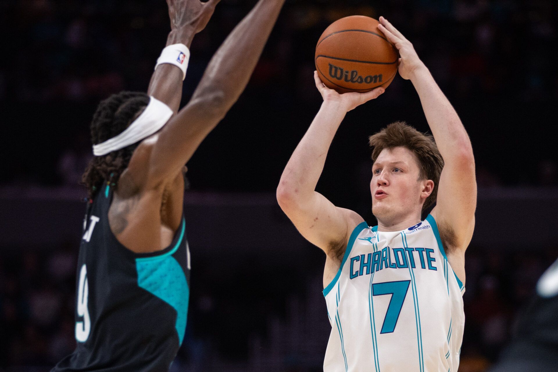 Charlotte Hornets guard Kon Knueppel (7) shoots the ball against the Portland Trail Blazers during the first quarter at Spectrum Center.