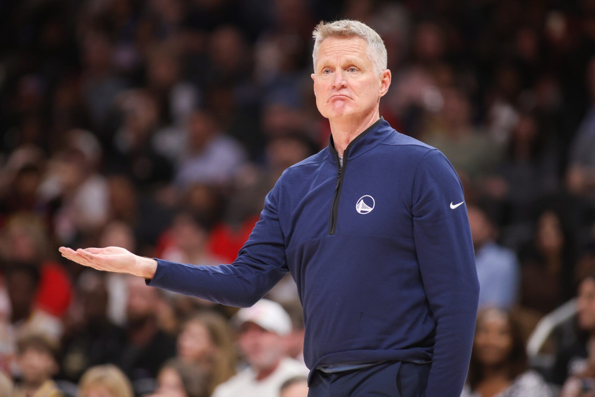 Golden State Warriors head coach Steve Kerr calls for a review against the Atlanta Hawks in the second quarter at State Farm Arena.