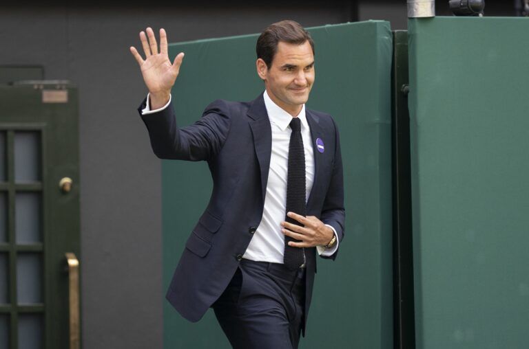 On the inaugural middle Sunday for play, Wimbledon celebrates 100 years since their move to Church Road and the centenary of Centre Court. Past champions were on court for this special ceremony on day seven at All England Lawn Tennis and Croquet Club. Shown here: Roger Federer (SUI).