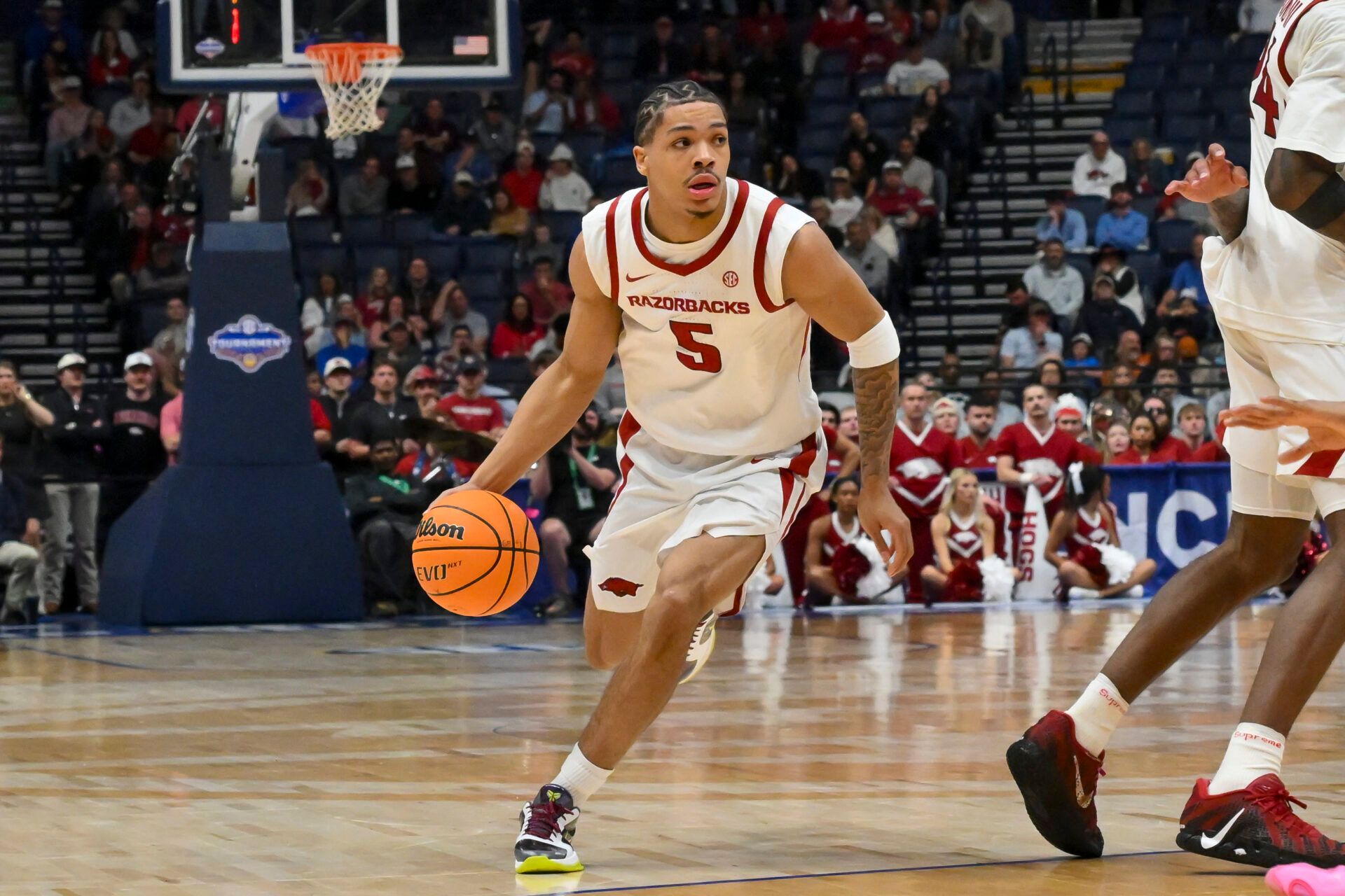 Arkansas Razorbacks guard Darius Acuff Jr. (5) drives to the basket against the Oklahoma Sooners during the first half at Bridgestone Arena.