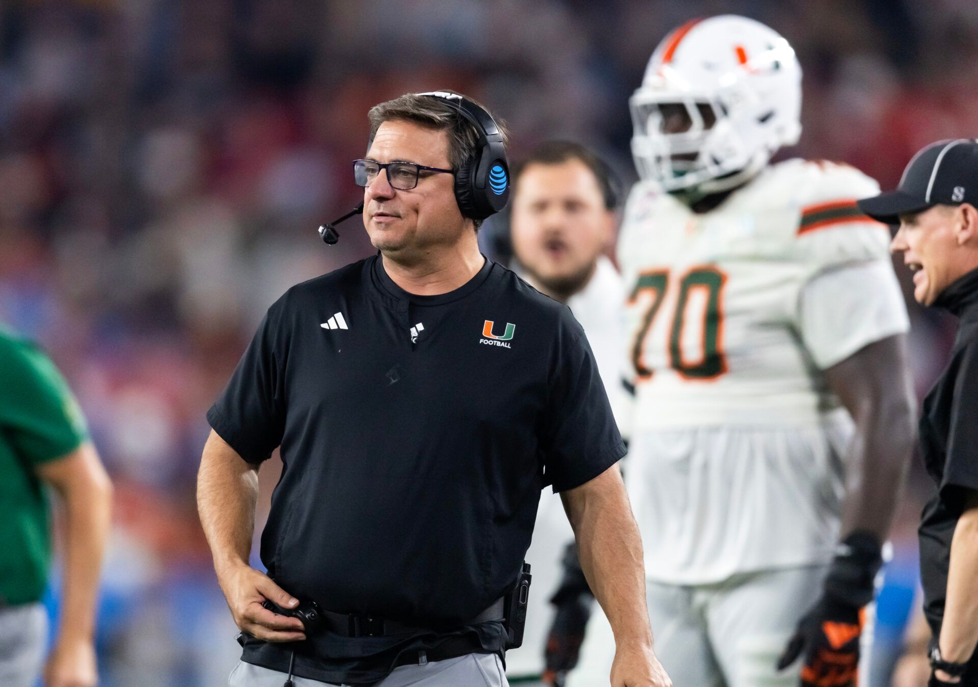 Miami Hurricanes offensive coordinator Shannon Dawson against the Mississippi Rebels during the 2026 Fiesta Bowl and semifinal game of the College Football Playoff at State Farm Stadium.