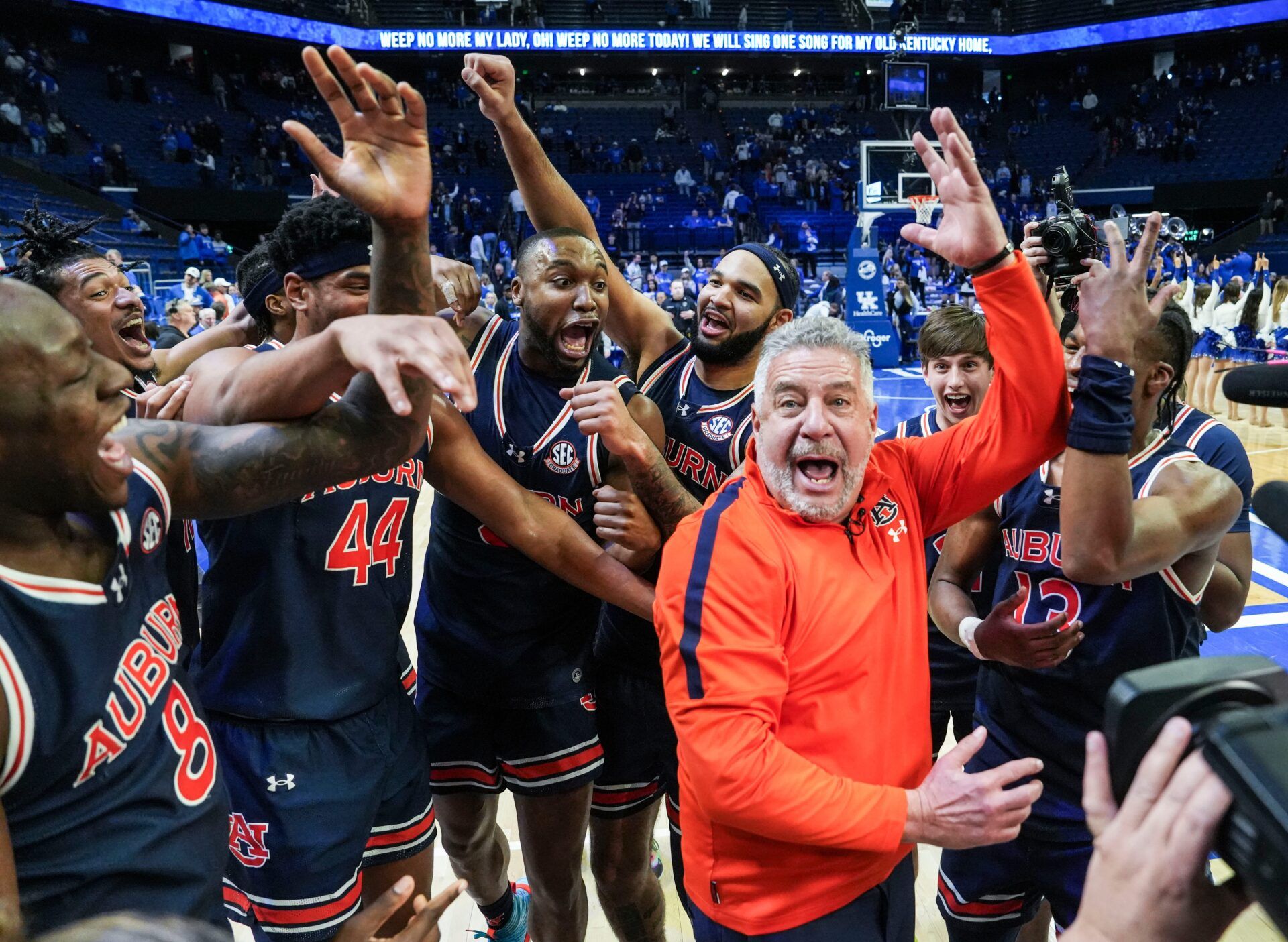 Auburn head coach Bruce Pearl and his No.1 Tigers celebrate after 94-78 win over Kentucky -- the first win at Rupp Arena since 1988 in SEC basketball Saturday afternoon in Lexington, Kentucky March 1, 2025