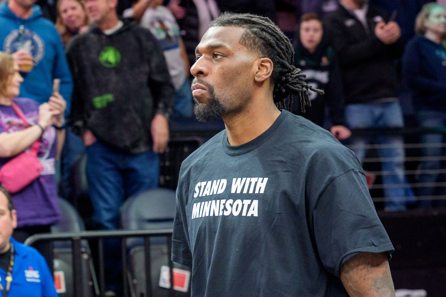 Minnesota Timberwolves center Naz Reid (11) enters the court before the game against the Oklahoma City Thunder at Target Center.