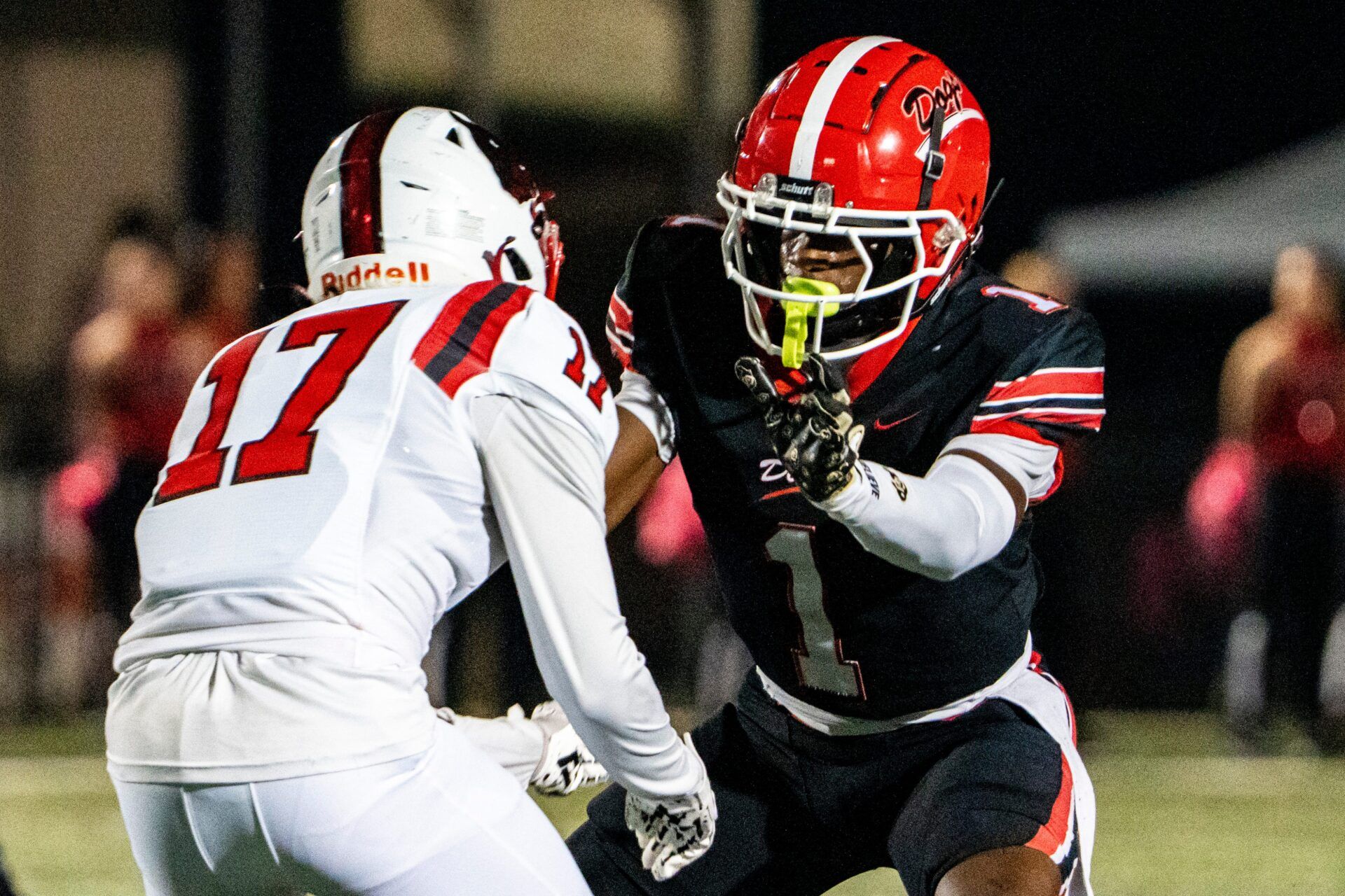 Brandon defensive back Preston Ashley (1) guards Petal wide receiver Drew Moody (17) during a high school football game between Petal and Brandon at Bulldog Stadium in Brandon, Miss., on Friday, Oct. 17, 2025. Petal defeated Brandon 27-21.