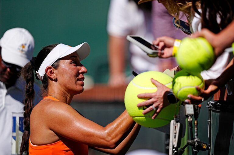 Jessica Pegula signs her autograph for fans after defeating Belinda Bencic 6-3, 7-6 in their BNP Paribas Open fourth-round match in Indian Wells, Calif., on Wednesday, March 11, 2026.
