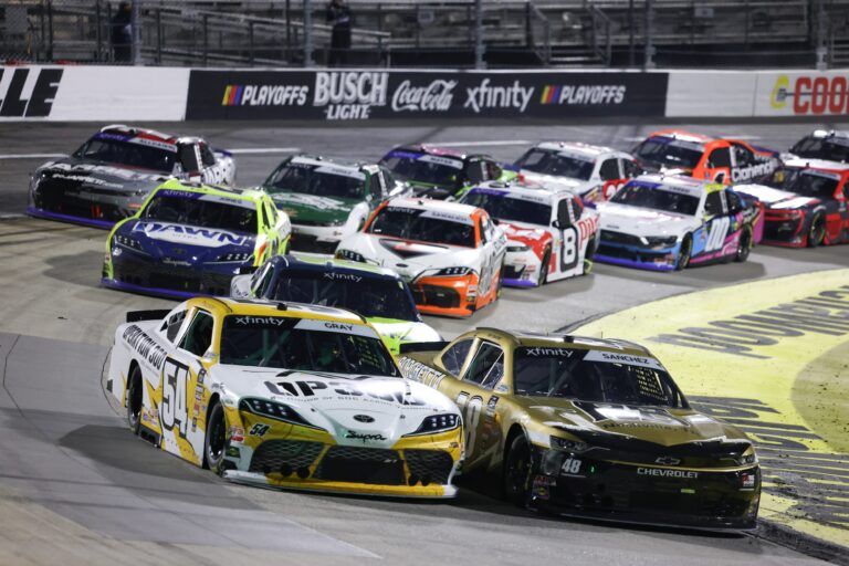 NASCAR Xfinity Series drivers Taylor Gray (54) and Nick Sanchez (48) race for the lead during the final stage the NASCAR Xfinity Series Playoff Race at Martinsville Speedway.