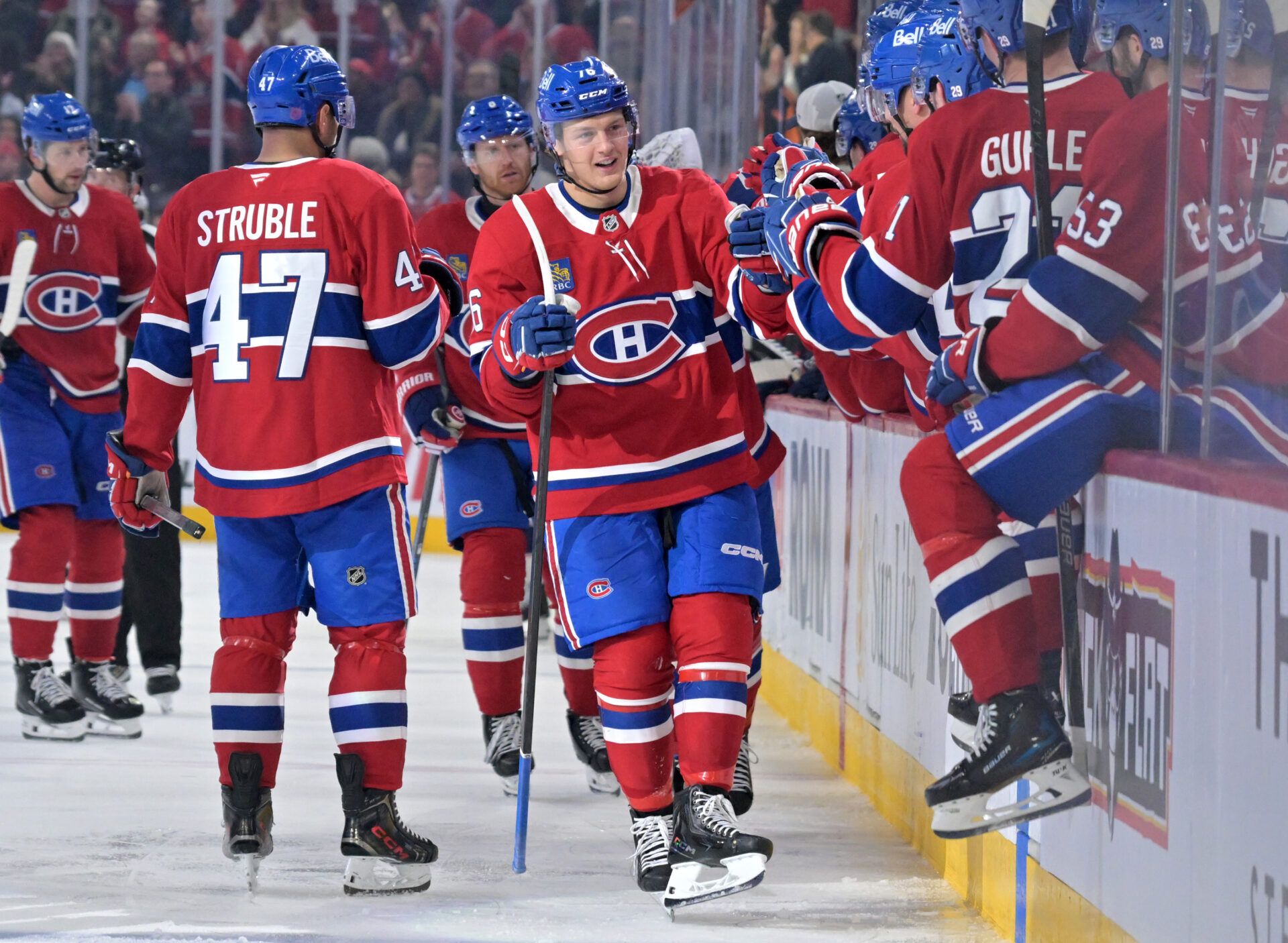 Montreal Canadiens forward Zack Bolduc (76) celebrates with teammates at the Bell Centre.