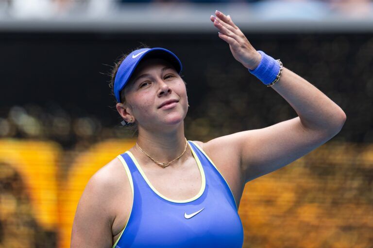 Amanda Anisimova of United States celebrates her victory over Simona Waltert of Switzerland in the first round of the women’s singles at the Australian Open at Margaret Court Arena in Melbourne Park.