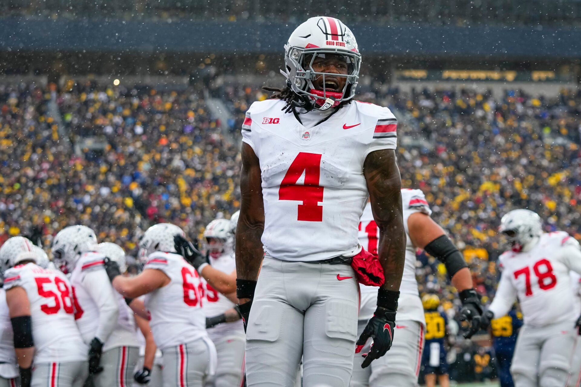 Ohio State Buckeyes wide receiver Jeremiah Smith (4) celebrates during the NCAA football game against the Michigan Wolverines at Michigan Stadium in Ann Arbor, Mich. on Nov. 29, 2025. Ohio State won 27-9.