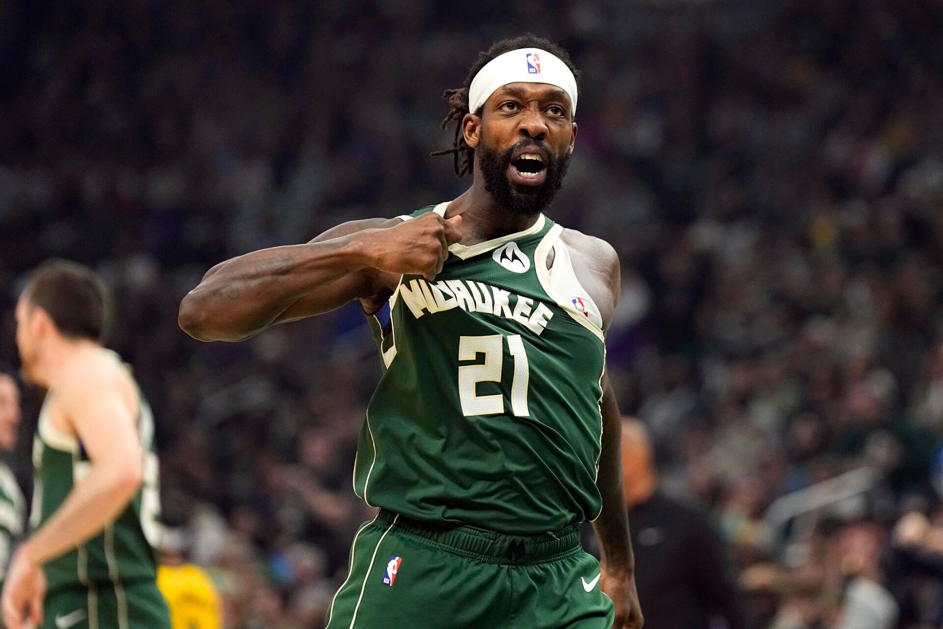 Milwaukee Bucks guard Patrick Beverley (21) gestures towards the crowd following a play during the second quarter against the Indiana Pacers during game five of the first round for the 2024 NBA playoffs at Fiserv Forum.
