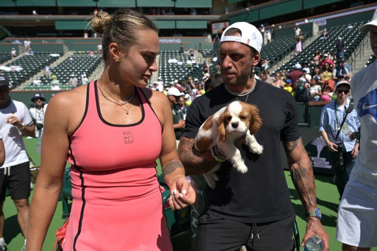 Aryna Sabalenka (BEL) with her fiance Georgios Frangulisafter and Cavalier King Charles puppy Ash after winning the womenÕs final of the BNP Paribas Open defeating Elena Rybakina (KAZ) at the Indian Wells Tennis Garden.