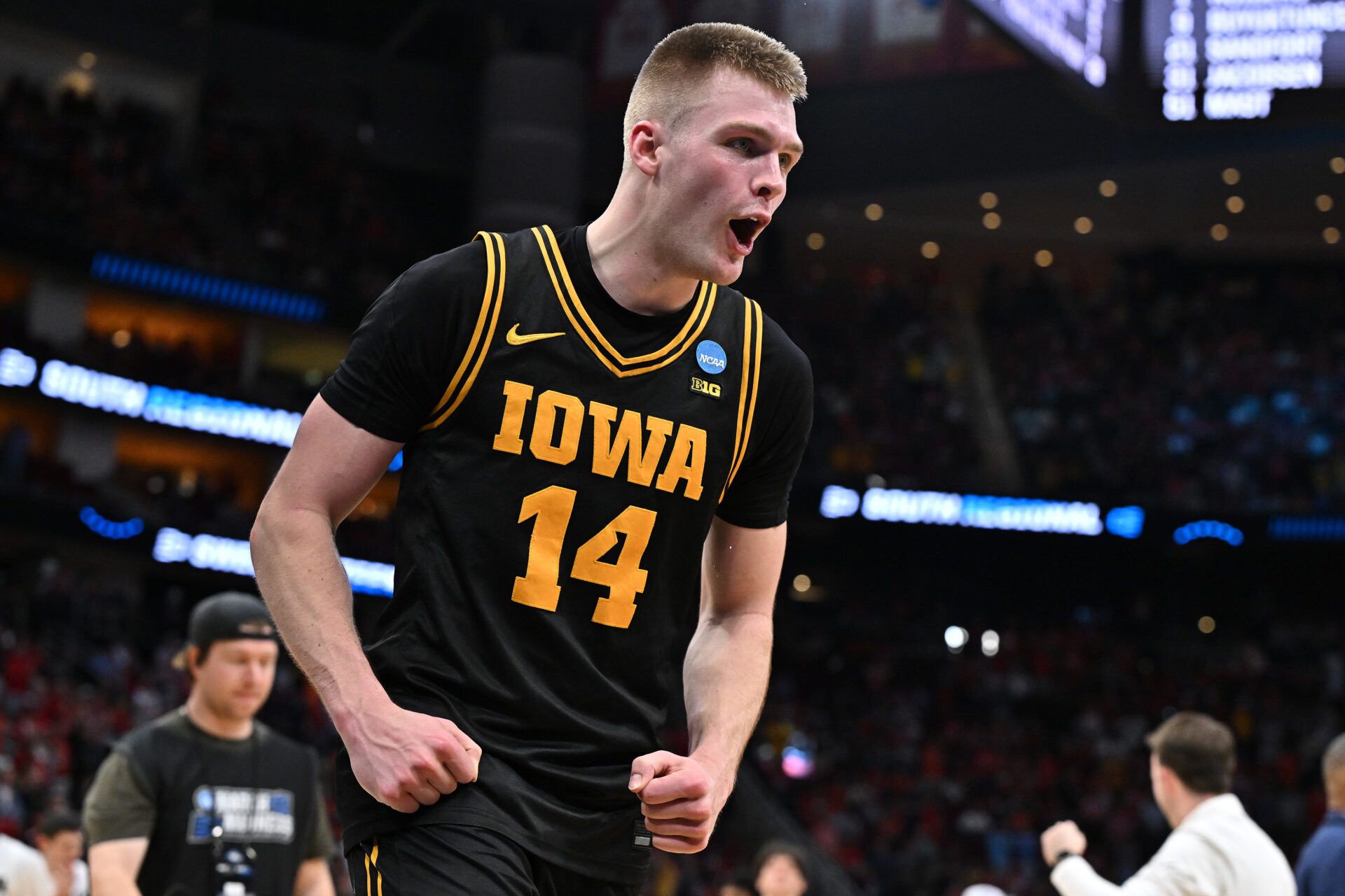 Iowa Hawkeyes guard Bennett Stirtz (14) reacts after beating the Nebraska Cornhuskers during a Sweet Sixteen game of the South Regional of the men's 2026 NCAA Tournament at Toyota Center.