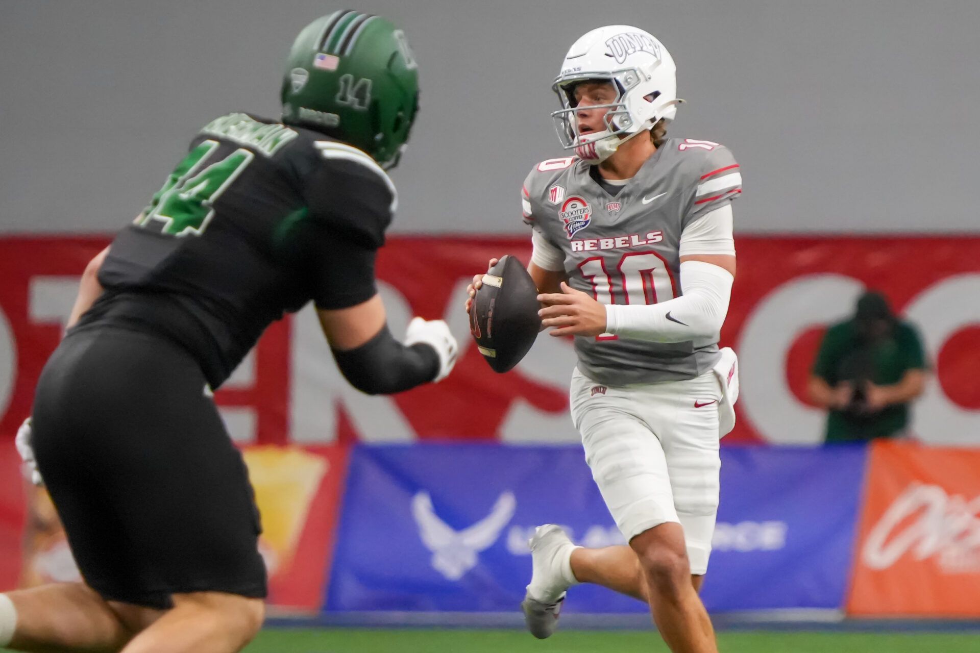 UNLV Rebels quarterback Anthony Colandrea (10) looks to throw downfield against the Ohio Bobcats during the first half at the Ford Center at The Star.