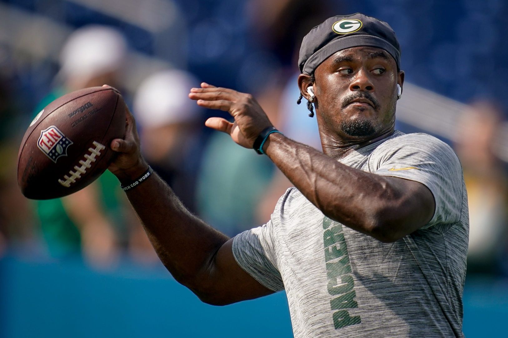 Green Bay Packers quarterback Malik Willis warms up before a game against the Tennessee Titans at Nissan Stadium in Nashville, Tenn., Sunday, Sept. 22, 2024.