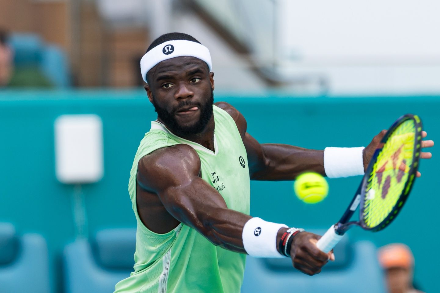 Frances Tiafoe of the United States swings a racket during his match against Jannik Sinner of Italy in the quarter finals of the menÕs singles at the Miami Open at Hard Rock Stadium.