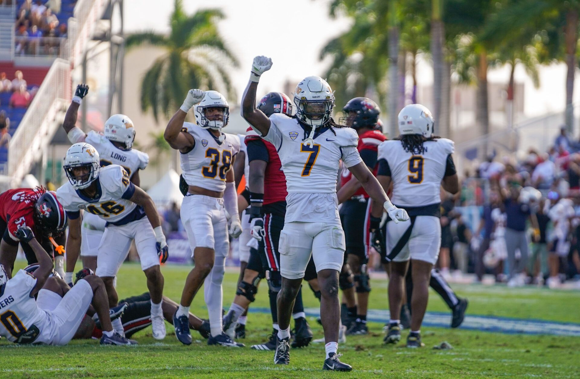 Toledo Rockets safety Emmanuel McNeil-Warren (7) celebrates a third down stop against the Louisville Cardinals during the third quarter of the Boca Raton Bowl at Flagler CU Stadium.