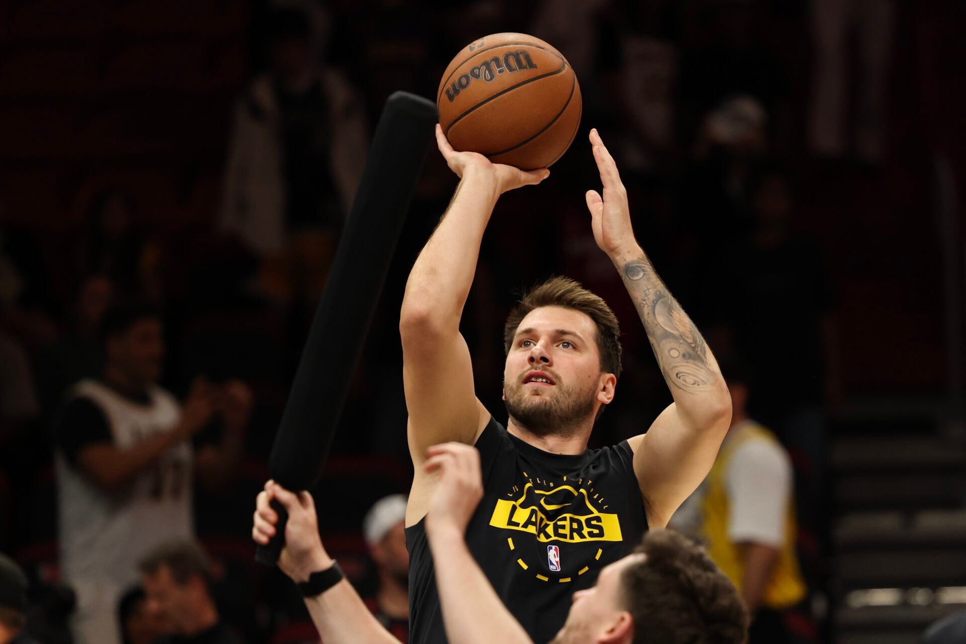 Los Angeles Lakers guard Luka Doncic (77) warms up before tip off against the Miami Heat at Kaseya Center.
