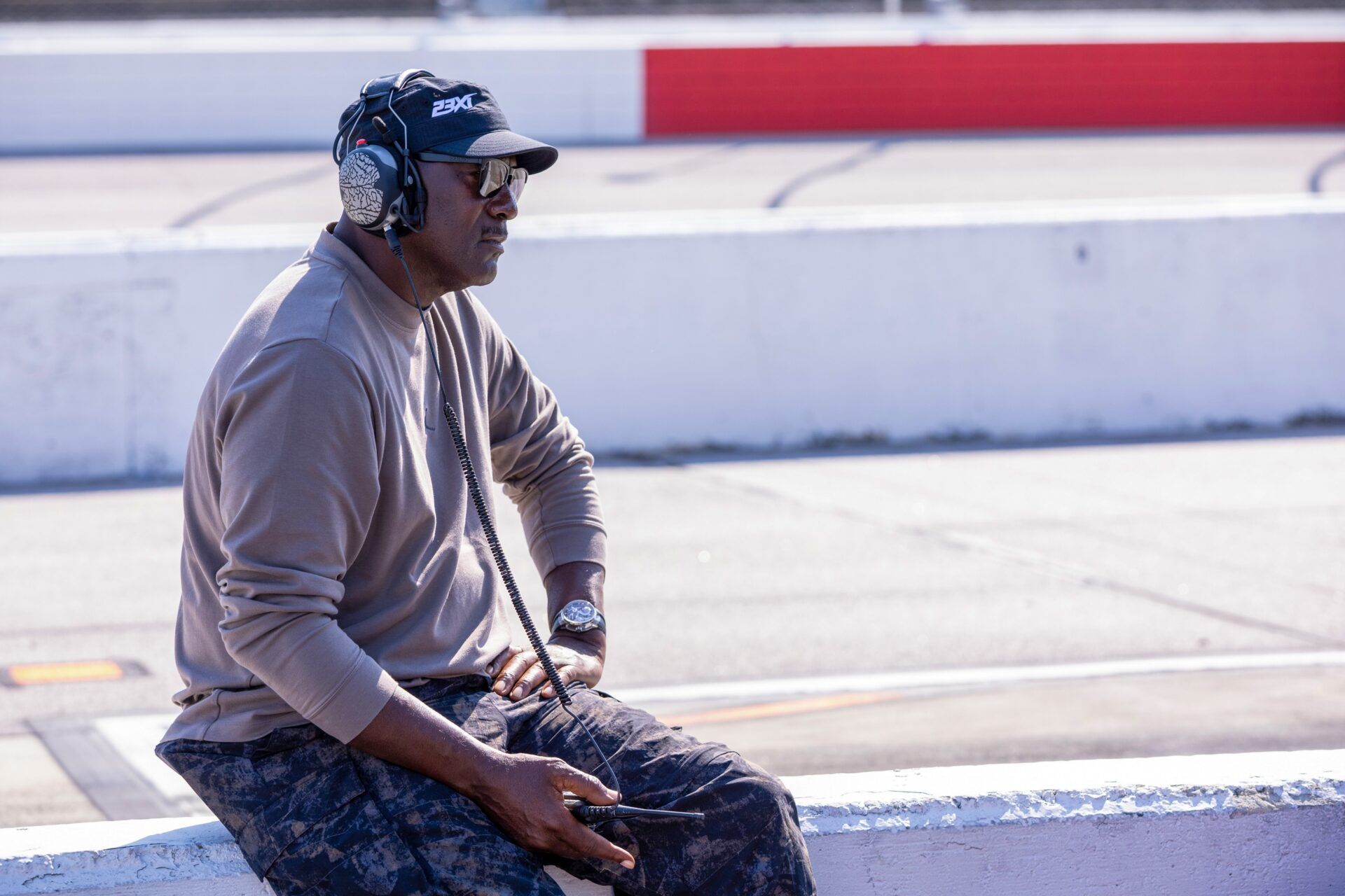 23XI Racing Owner Michael Jordan sits on the wall during the Goodyear 400 at Darlington Raceway.