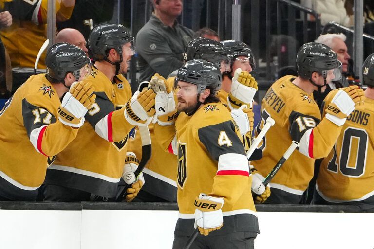 Vegas Golden Knights defenseman Rasmus Andersson (4) celebrates after scoring a goal against the Washington Capitals during the second period at T-Mobile Arena.