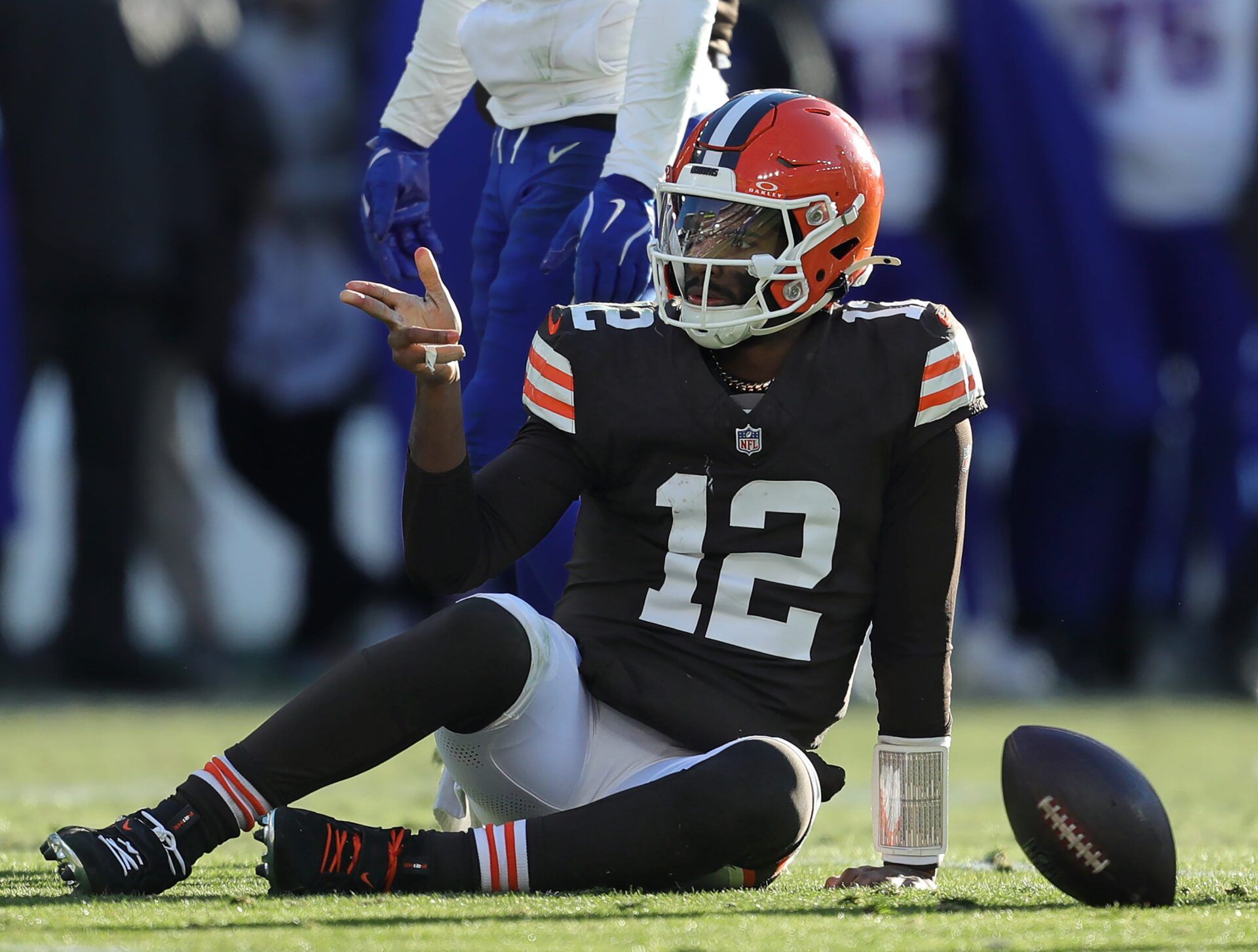 Cleveland Browns quarterback Shedeur Sanders (12) signals a first down during the second half of an NFL football game at Huntington Bank Field, Dec. 21, 2025, in Cleveland, Ohio.