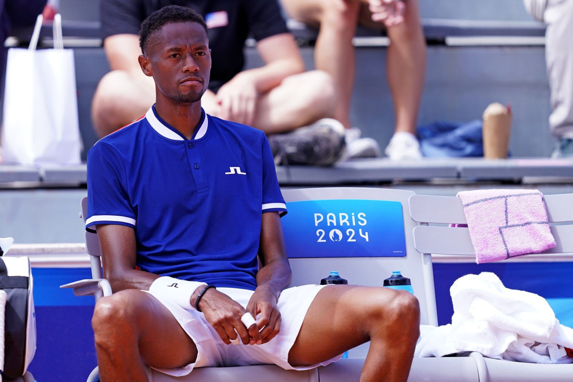 Christopher Eubanks (USA) hits the ball against Benjamin Hassan (LBN) in the men’s tennis singles first round during the Paris 2024 Olympic Summer Games at Stade Roland Garros.