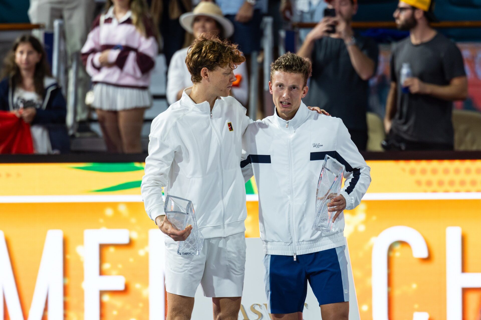 Jannik Sinner of Italy and Jiri Lehecka of the Czech Republic pose with their trophies after the final of the men’s singles at the Miami Open at the Hard Rock Stadium.
