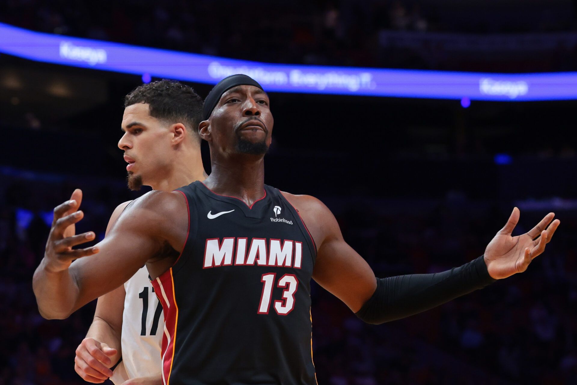 Miami Heat center Bam Adebayo (13) reacts toward the referee during the third quarter against the Brooklyn Nets at Kaseya Center.