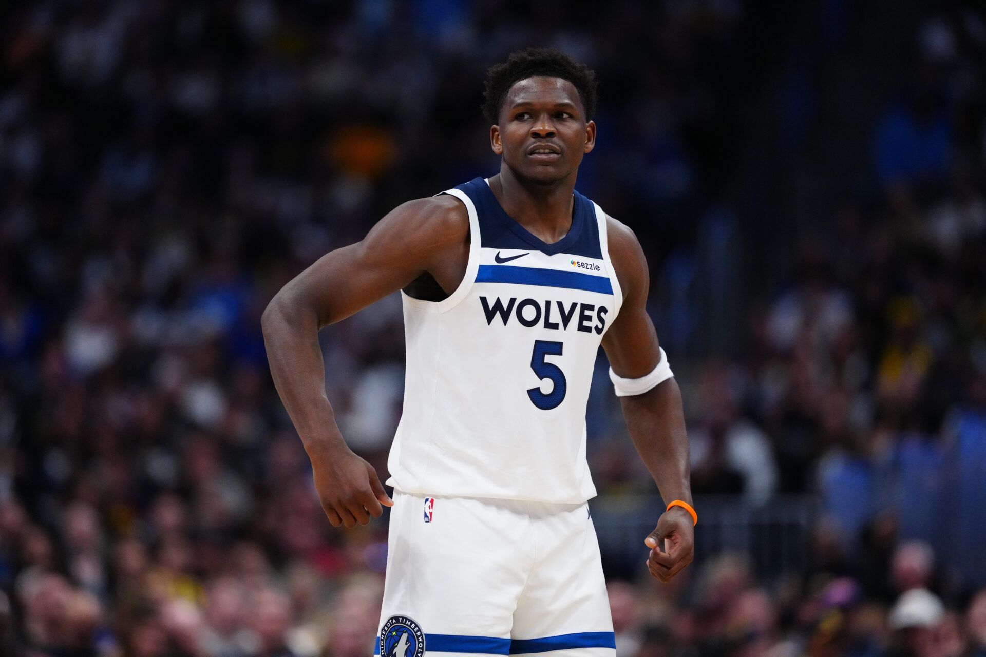 Minnesota Timberwolves guard Anthony Edwards (5) reacts to points scored in the second quarter against the Denver Nuggets at Ball Arena.