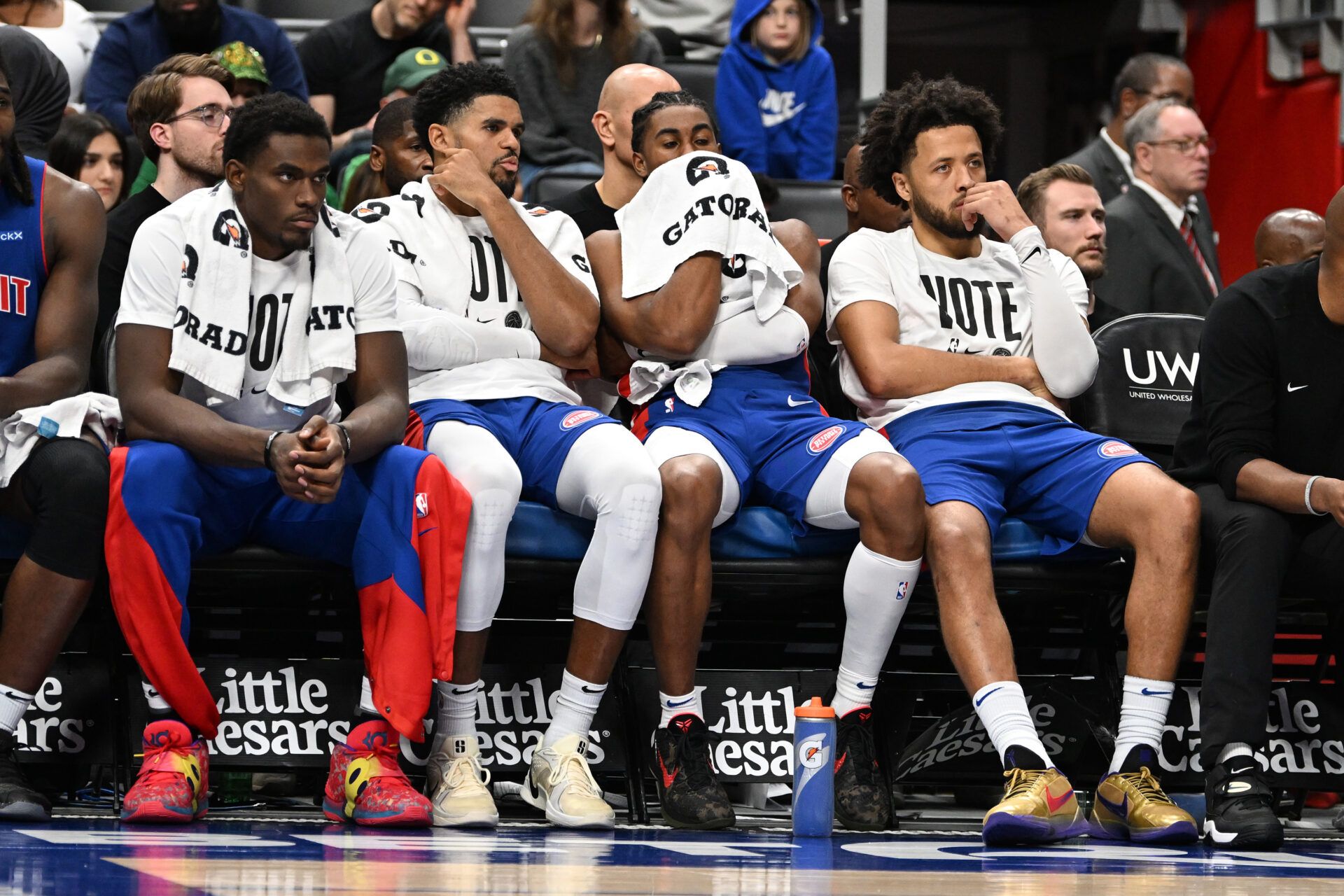 Detroit Pistons players, from left, center Jalen Duren, forward Tobias Harris, guard Jaden Ivey and  guard Cade Cunningham react to their 30-point loss to the New York Knicks late in the fourth quarter at Little Caesars Arena.