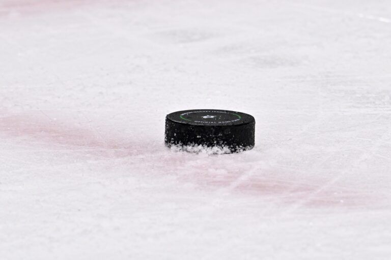 A view of an NHL puck with logo during the game between the Dallas Stars and the Winnipeg Jets in game three of the second round of the 2025 Stanley Cup Playoffs at American Airlines Center.