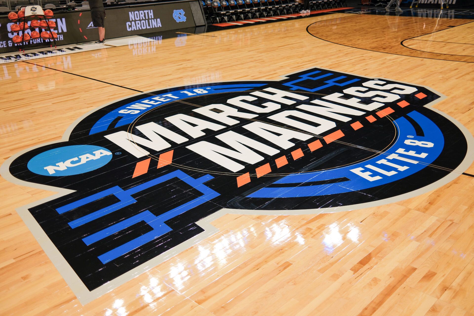 A detailed view of the March Madness Sweet 16 Elite 8 center court logo during a practice session press conference ahead ofÊthe women's 2026 NCAA Tournament at Dickies Arena.