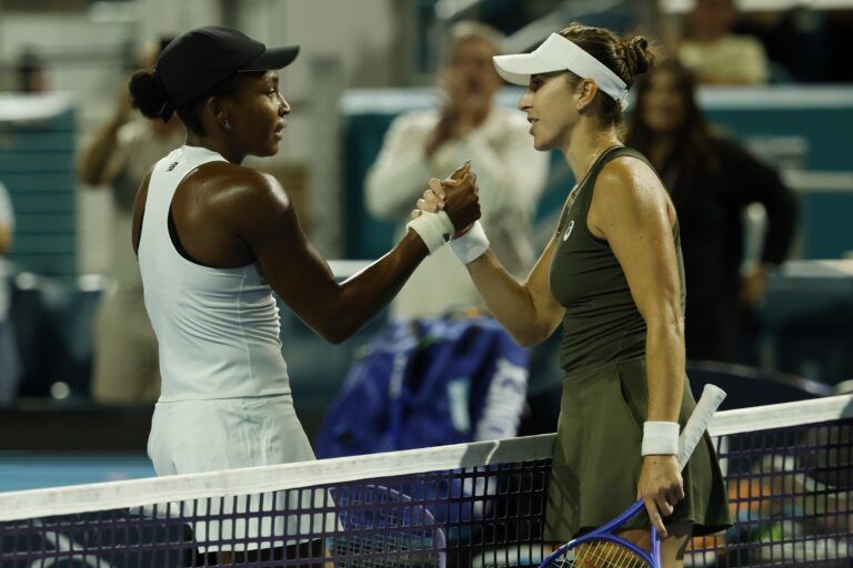 Coco Gauff (USA) (L) shakes hands with Belinda Bencic (SUI) (R) at the net after their match on day eight of the 2026 Miami Open at Hard Rock Stadium.