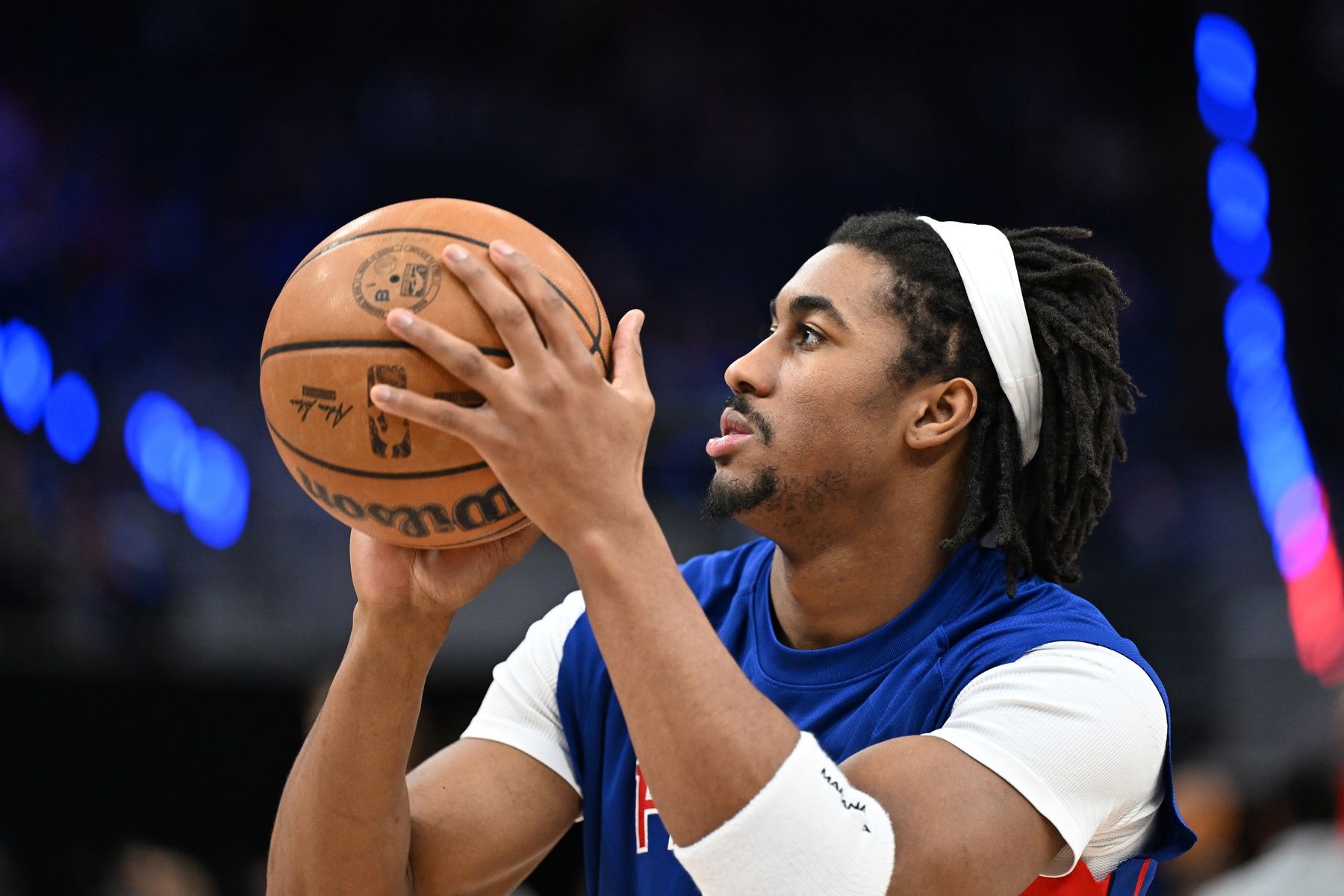 Detroit Pistons guard Jaden Ivey (23) shoots the ball during pregame warmups before their game against the Chicago Bulls at Little Caesars Arena.