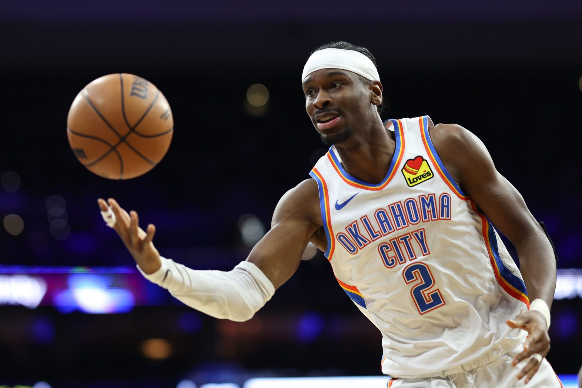 Oklahoma City Thunder guard Shai Gilgeous-Alexander (2) passes the ball against the Philadelphia 76ers during the third quarter at Xfinity Mobile Arena.