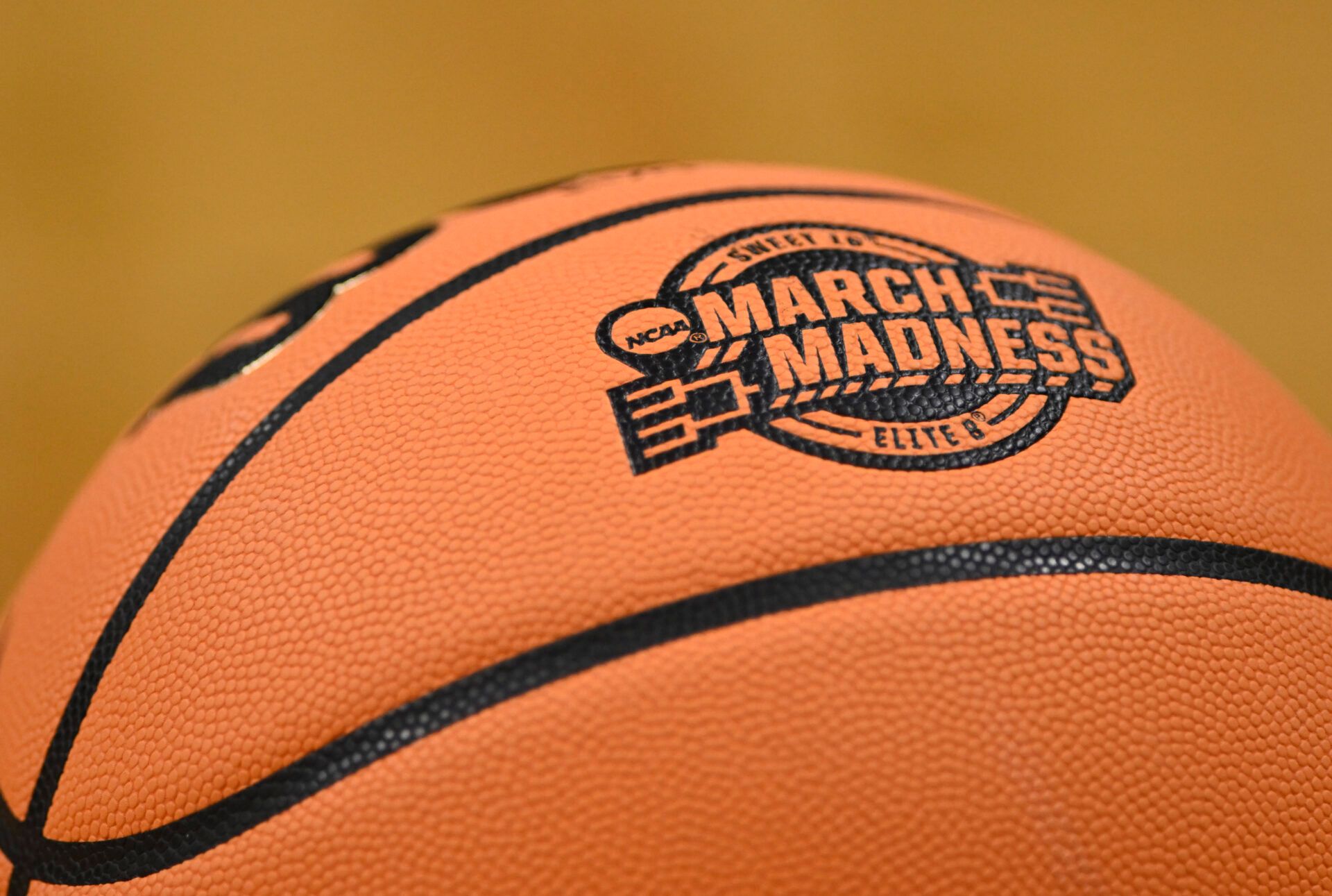 The NCAA March Madness logo is seen on a basketball in the first half between the Texas Longhorns and the Purdue Boilermakers during a Sweet Sixteen game of the West Regional of the men's 2026 NCAA Tournament at SAP Center.